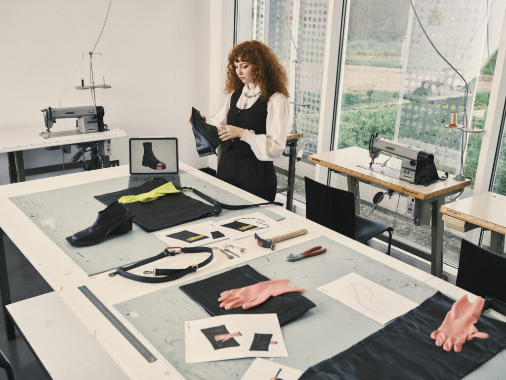 Undergraduate in Fashion Accessories Design student Natalie Da Ros working on her creations at Polimoda Design Lab in Scandicci