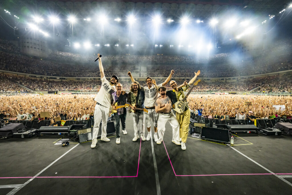 The Pinguini Tattici Nucleari band at the San Siro stadium in Milan, wearing the outfits created for them by Polimoda students, photo by Francesco Prandoni