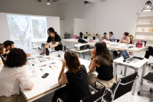 Master in Bag Design student presenting her creations in front of Roger Vivier's professionals.