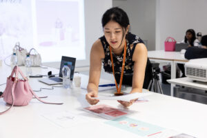 Master in Bag Design student presenting her creations in front of Roger Vivier's professionals.