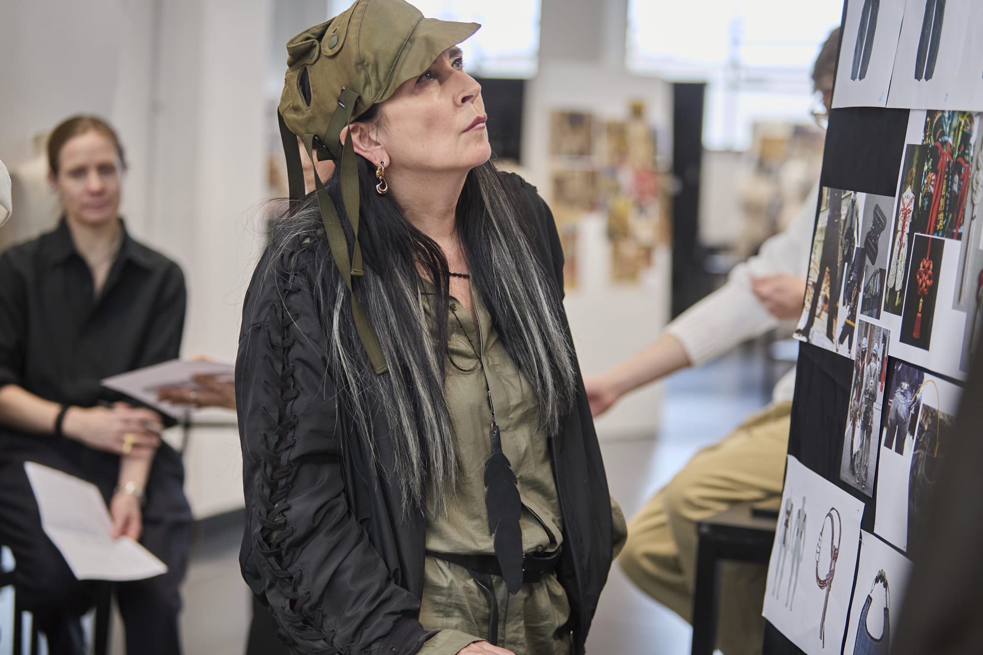 An Vandevorst reviewing garments and creative concepts with Polimoda Fashion Design students.