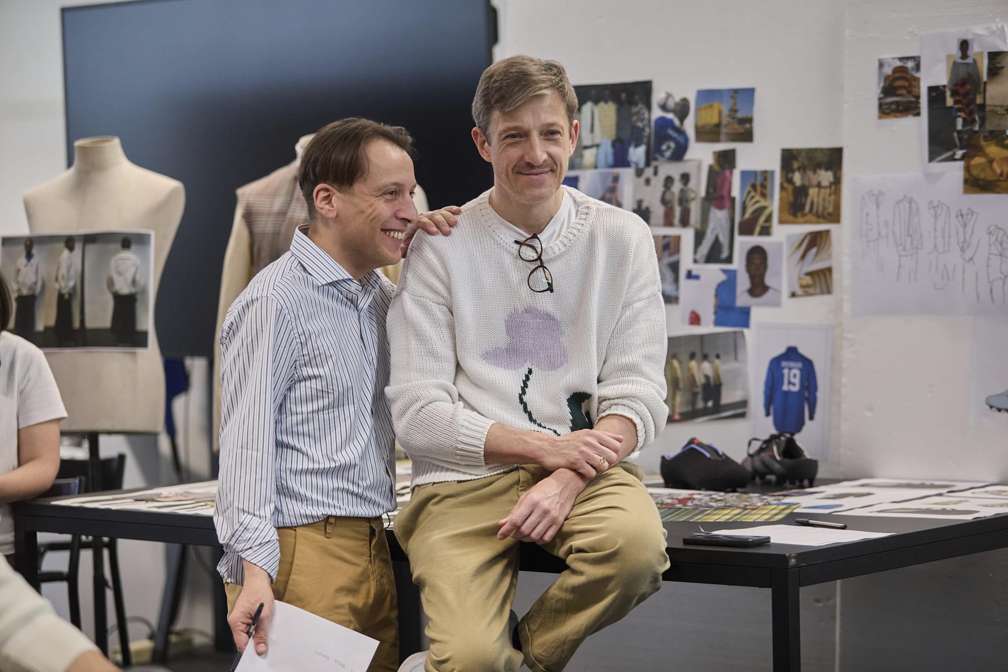 Luigi Giannetta and Maxence Dinant reviewing student fashion collections at the Manifattura Campus laboratories.