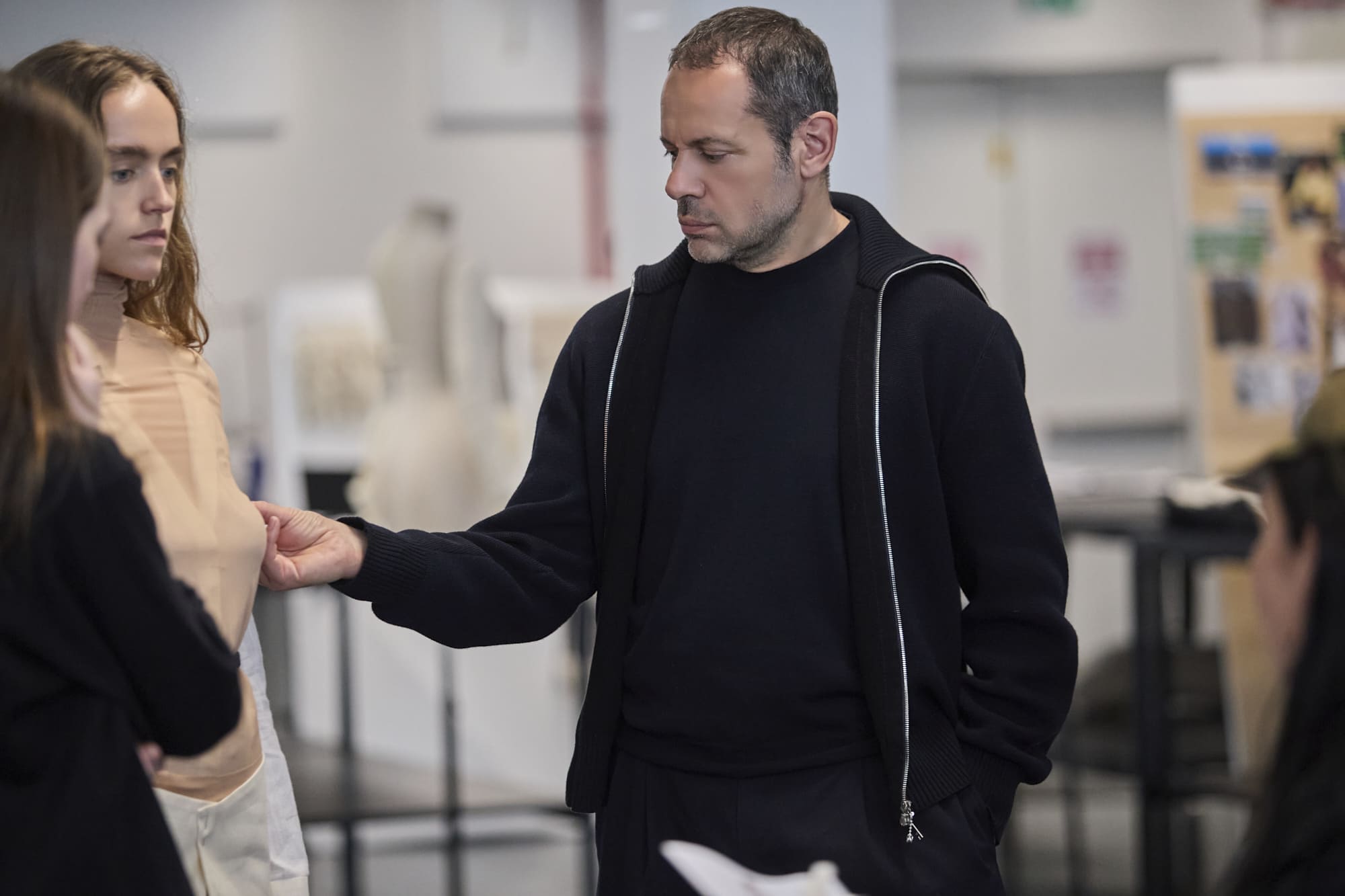 Massimiliano Giornetti reviewing Fashion Design student collections at Polimoda’s Manifattura Campus.