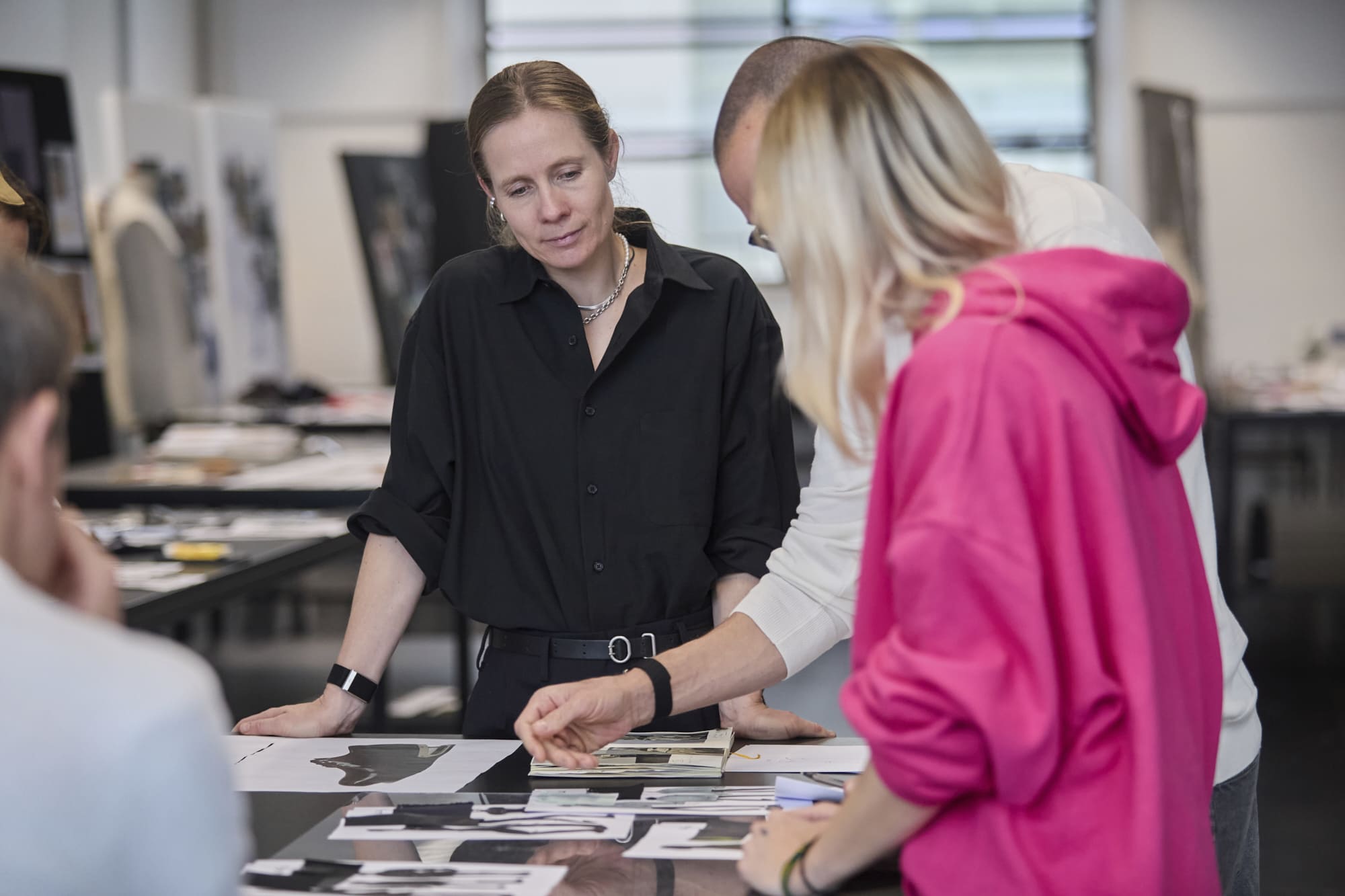 Luke and Lucie Meier mentoring Polimoda Fashion Design students during collection review sessions.